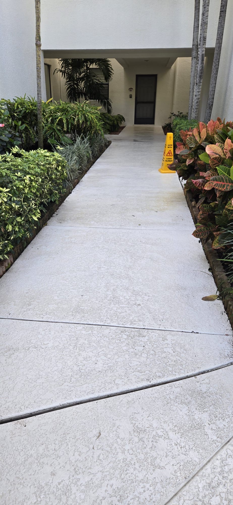 Janitorial cleaning services & Pressure Cleaning/soft washing of hallways in 4 story condominium located in prestigious Oak Harbour community, located in Juno Beach, FL 33408